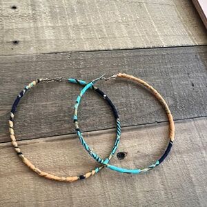 Never worn large fabric covered hoop earrings